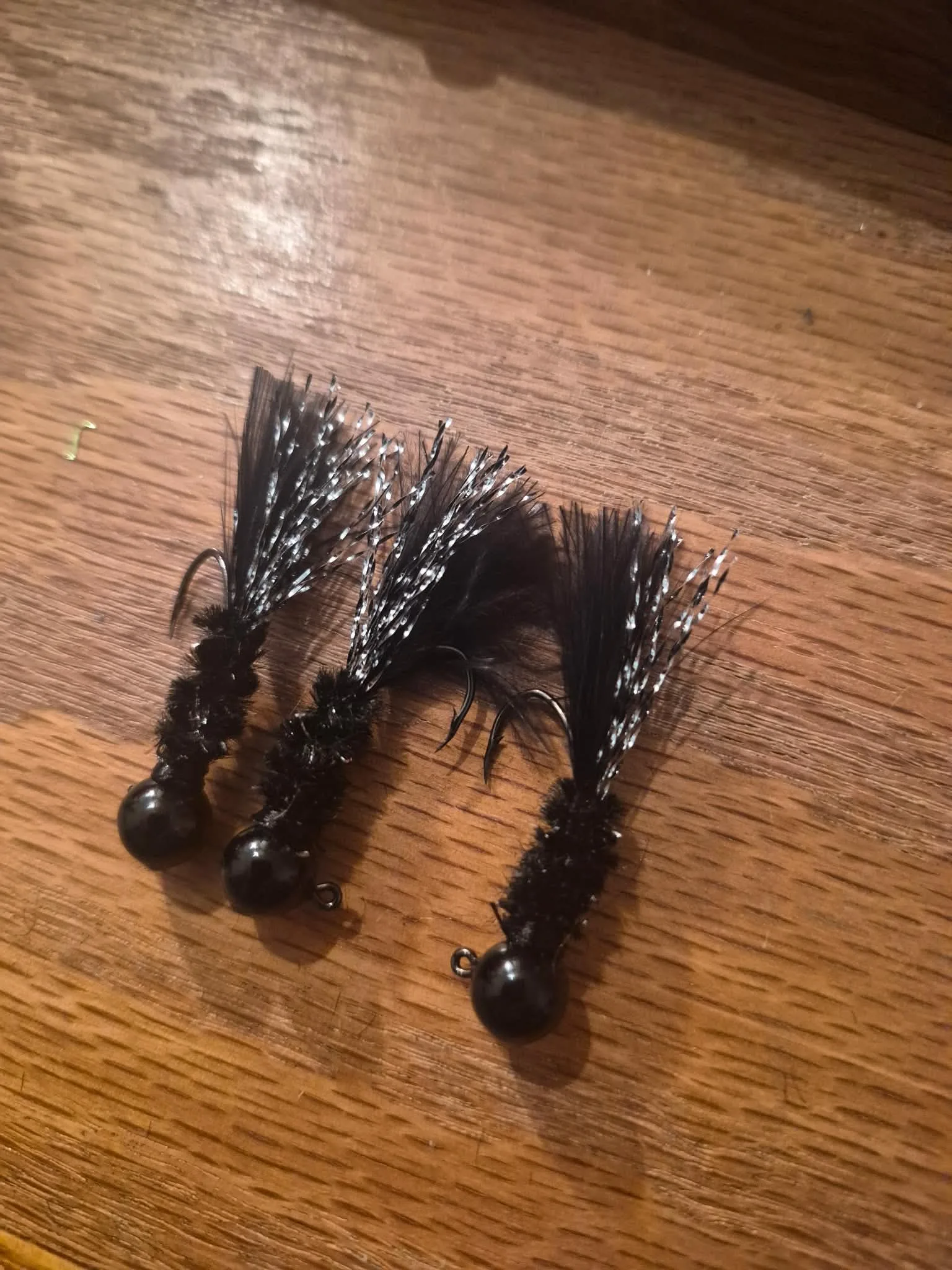 Black Widow jig — black fishing lure with silver flash