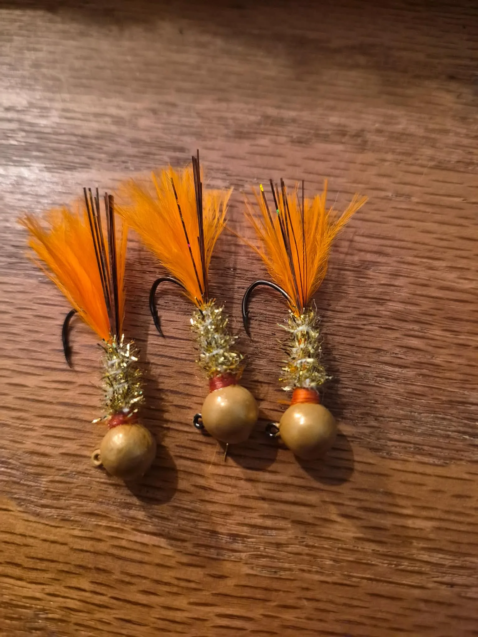 Golden Shiner jig — gold and orange fishing lure