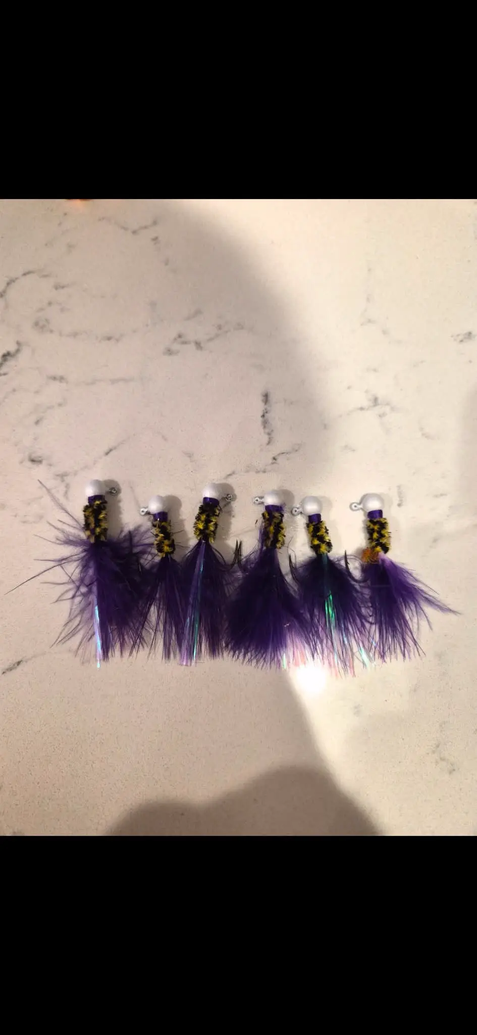 Mardi Gras jig — purple and gold fishing lure